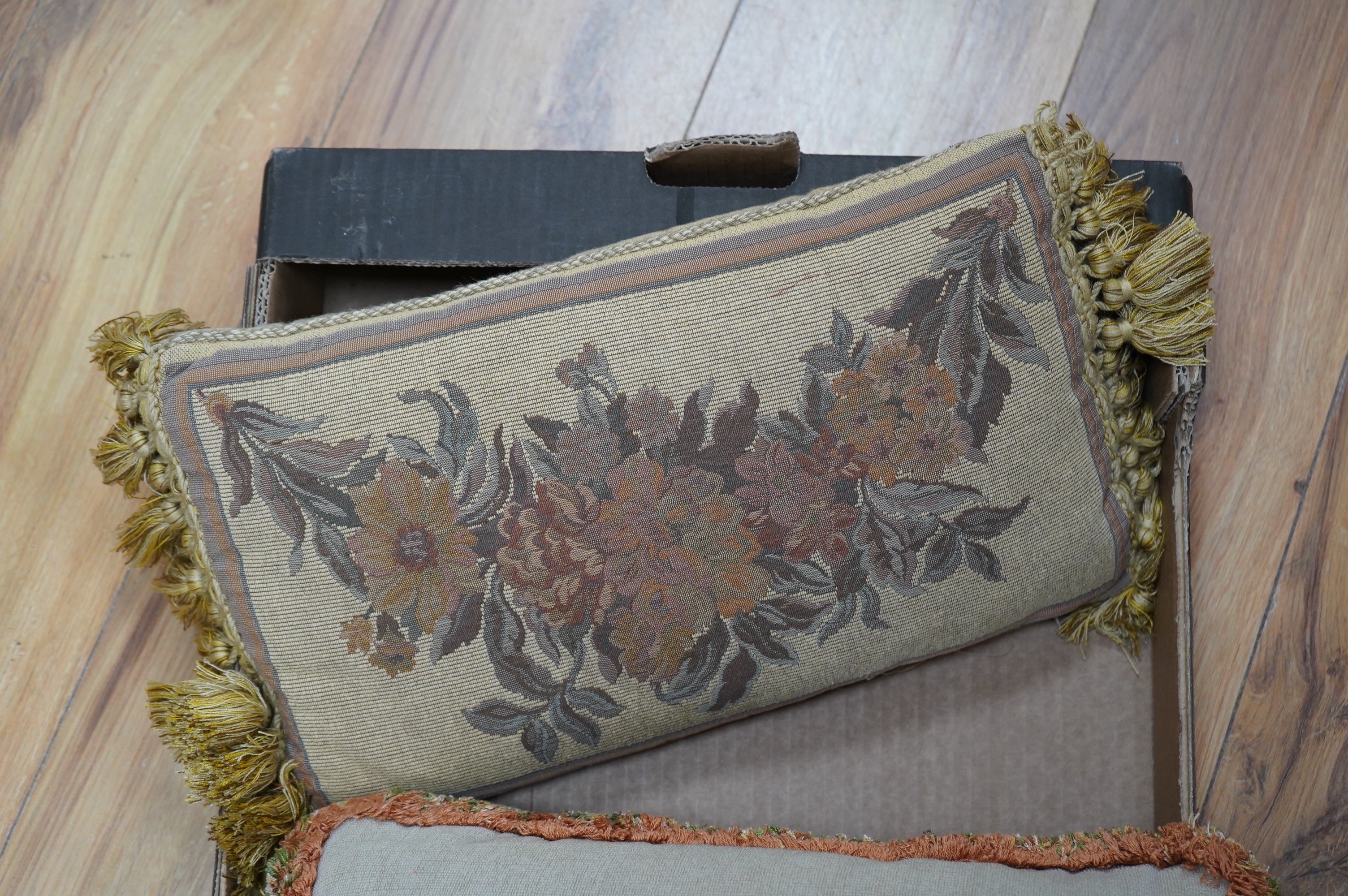 A collection of 18th and 19th century textiles, to include religious Maniples, two cushions, an embroidered chain stitch table cover with intricate edging, a Chinese embroidered panel and floral painted satin. Condition